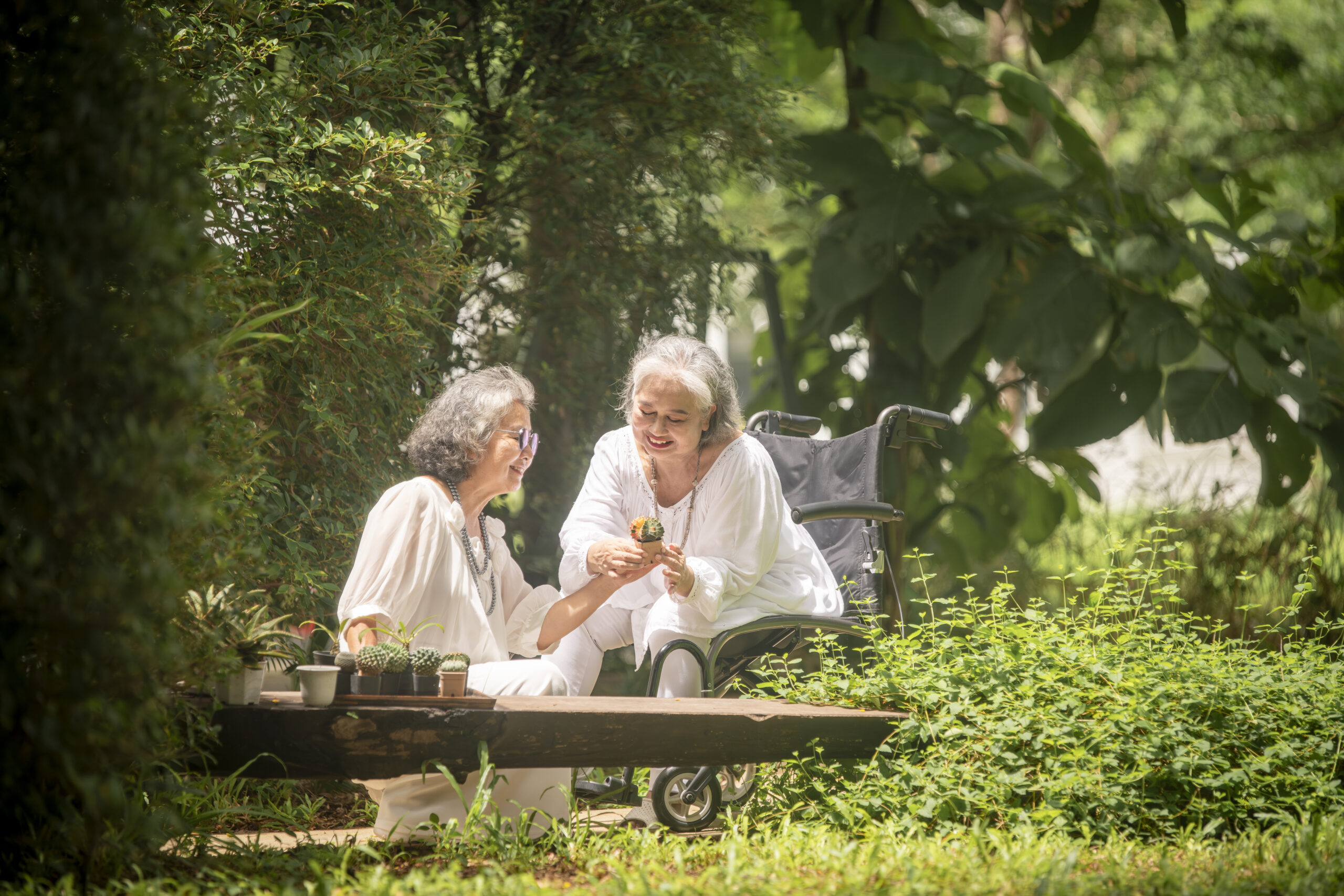 Two residents enjoying a garden together